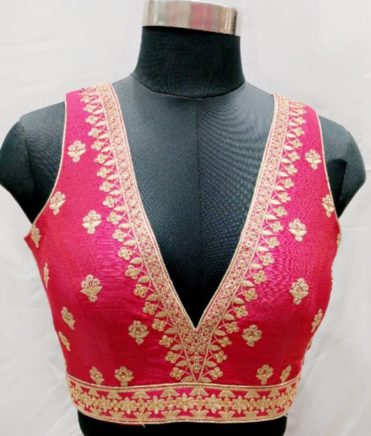 Sleeveless deep V neck blouse